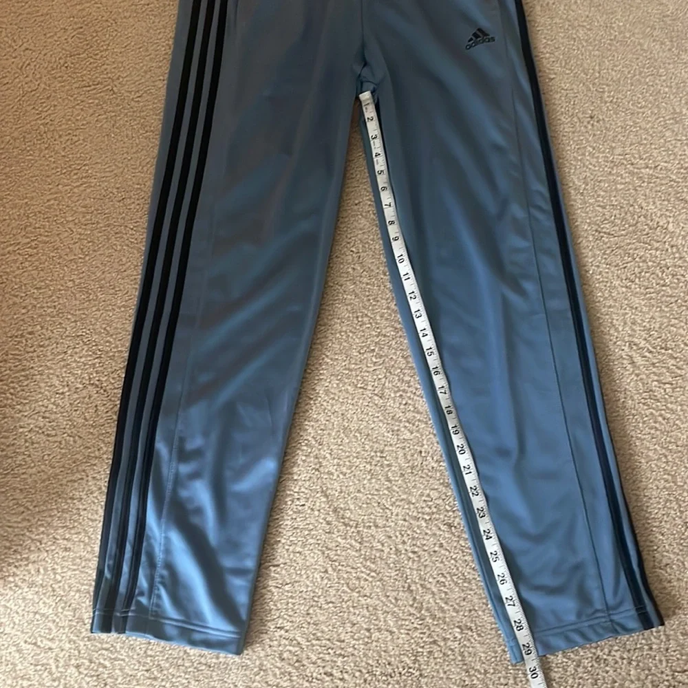 Adidas Men’s Joggers. Blue/grey color with black stripes.